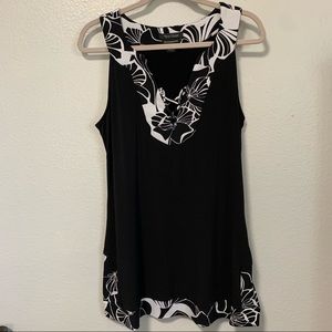 White House Black Market sleeveless top….black and white size large